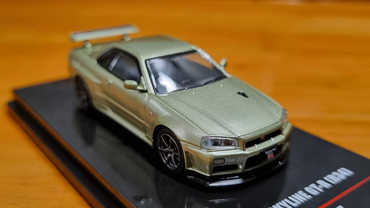 A 1/64 diecast Nissan Skyline GT-R R34 (INNO64, Millenium Jade) — illustrative of the 1:64 diecast format this Mini GT Z-Tune release shares, not the specific Silver Z-Tune livery itself
